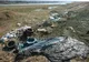 FOTO: Cauciucuri uzate, aruncate lângă lacul Galbeni!  A fost sesizată Garda de Mediu