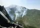 Pădurea de la Oituz arde de 4 zile. O aeronavă a forțelor aeriene îi ajută și astăzi pe pompieri
