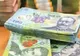 Cine sunt bugetarii cu salarii de lux vizați de supraimpozitare - Câți români au venituri de peste 25.000 de lei și în ce domenii lucrează